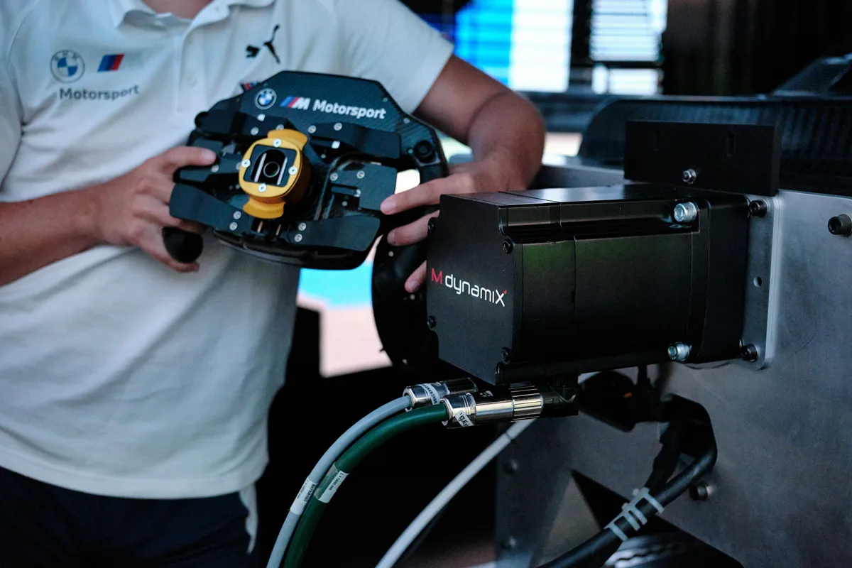 BMW M Motorsport works driver Max Hesse demonstrating the MdynamiX Force Feedback Actuator and steering system in the simulator. As an Official Partner of BMW M Motorsport, MdynamiX delivers realistic steering feel for virtual vehicle development.